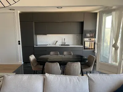 Coin salon dans l'établissement Appartement de charme sur les toits de Boulogne !
