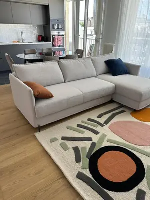 Coin salon dans l'établissement Appartement de charme sur les toits de Boulogne !