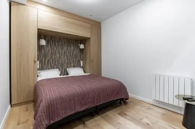 Un ou plusieurs lits dans un hébergement de l'établissement Sous Plex 6 personnes - PARIS 11
