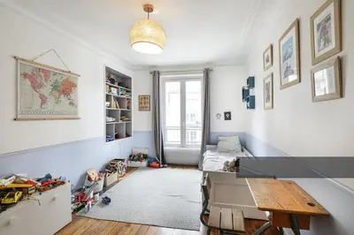 Coin salon dans l'établissement En plein coeur de Levallois appartement de famille