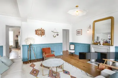 Coin salon dans l'établissement En plein coeur de Levallois appartement de famille