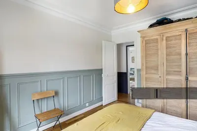 Un ou plusieurs lits dans un hébergement de l'établissement En plein coeur de Levallois appartement de famille