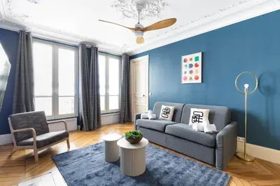 Coin salon dans l'établissement COSY APPARTMENT IN THE HEART OF PARIS