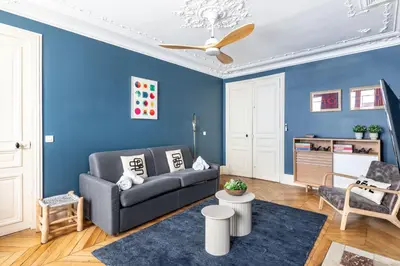 Coin salon dans l'établissement COSY APPARTMENT IN THE HEART OF PARIS