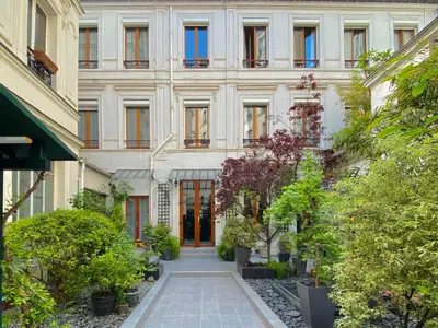 Jardin de l'établissement CamParis - B&B - Chambre d'hôtes