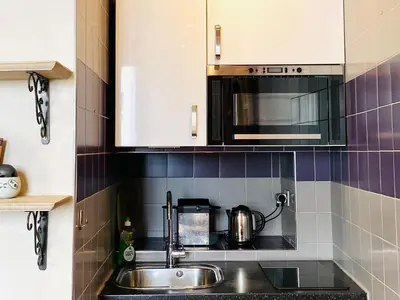 Cuisine ou kitchenette dans l'établissement CamParis - B&B - Chambre d'hôtes