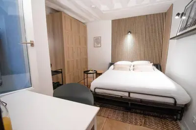 Un ou plusieurs lits dans un hébergement de l'établissement cosy studio#heart of Le Marais