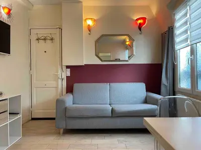 Coin salon dans l'établissement Wonderful apartment near Arc de Triomphe 2P