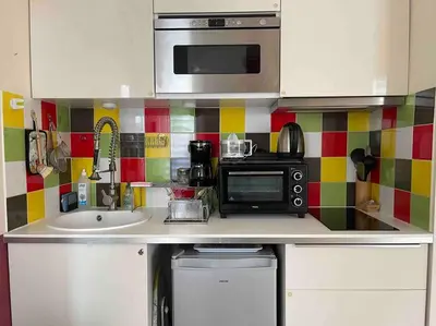Cuisine ou kitchenette dans l'établissement Wonderful apartment near Arc de Triomphe 2P