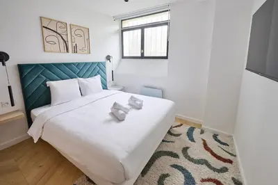 Un ou plusieurs lits dans un hébergement de l'établissement Appartement6P#2Bedrooms#Jardin des Plantes