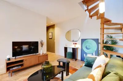 Télévision ou salle de divertissement dans l'établissement Luxury Duplex