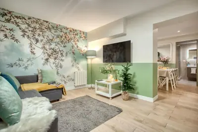 Télévision ou salle de divertissement dans l'établissement Amazing Apart New Bastille 3 Bedrooms 2 Bathrooms