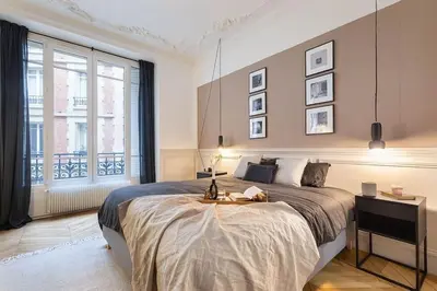 Un ou plusieurs lits dans un hébergement de l'établissement Nocelle - 2 chambres à Batignolles