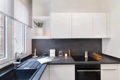 Cuisine ou kitchenette dans l'établissement Nocelle - 2 chambres à Batignolles