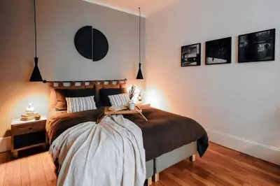 Un ou plusieurs lits dans un hébergement de l'établissement Royo - 1 chambre à Auteuil