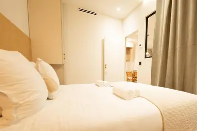 Un ou plusieurs lits dans un hébergement de l'établissement NEW Luxury & Cozy Apartment - 6p