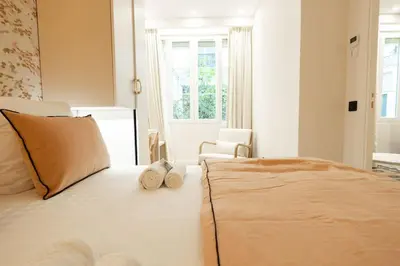Un ou plusieurs lits dans un hébergement de l'établissement New Luxury apartment - 4 people