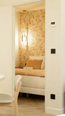 Un ou plusieurs lits dans un hébergement de l'établissement New Luxury apartment - 4 people