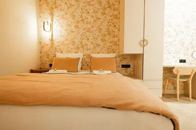 Un ou plusieurs lits dans un hébergement de l'établissement New Luxury apartment - 4 people