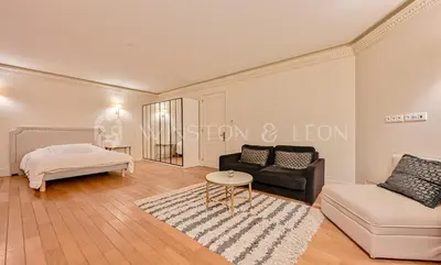 Un ou plusieurs lits dans un hébergement de l'établissement Appartement Paris 7e Invalides Tour Eiffel