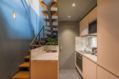 Cuisine ou kitchenette dans l'établissement Séjour au Taj proche Tour-Eiffel