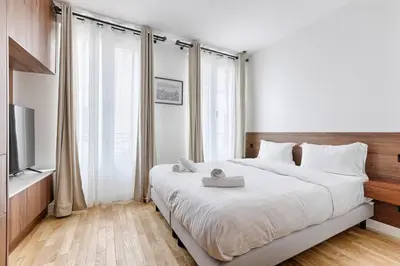 Un ou plusieurs lits dans un hébergement de l'établissement MyKeypers - Amazing Luxe & Cosy Flat 2BR/6P - Bastille