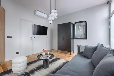Télévision ou salle de divertissement dans l'établissement Luxury Studio 2P - Marais - Bastille