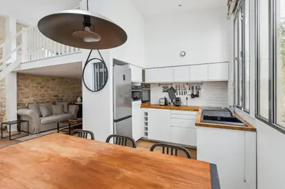 Cuisine ou kitchenette dans l'établissement Luxury living: appartement contemporain by Weekome