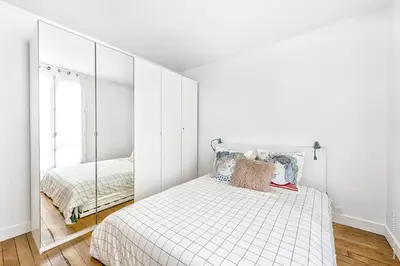 Un ou plusieurs lits dans un hébergement de l'établissement Marais - Montmorency 2bdr by B'Your Home