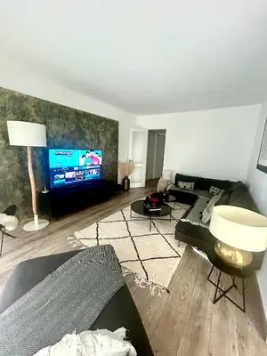 Télévision ou salle de divertissement dans l'établissement Confort cosy