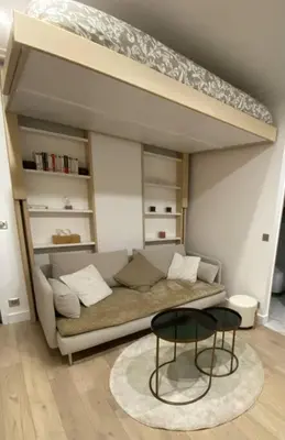 Coin salon dans l'établissement Joli studio paris 17