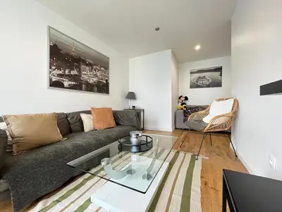 Coin salon dans l'établissement Appartement la défense Courbevoie