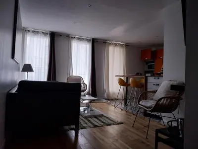 Coin salon dans l'établissement Appartement la défense Courbevoie