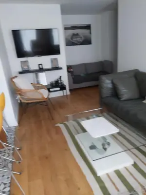 Coin salon dans l'établissement Appartement la défense Courbevoie