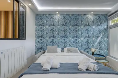 Un ou plusieurs lits dans un hébergement de l'établissement Stylish & New 1 Bdr Flat with A/C-Trendy Paris 11
