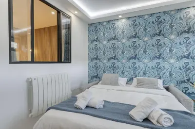 Un ou plusieurs lits dans un hébergement de l'établissement Stylish & New 1 Bdr Flat with A/C-Trendy Paris 11