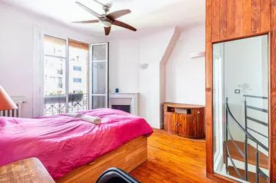 Un ou plusieurs lits dans un hébergement de l'établissement GuestReady -Logement accueillant proche Montmartre