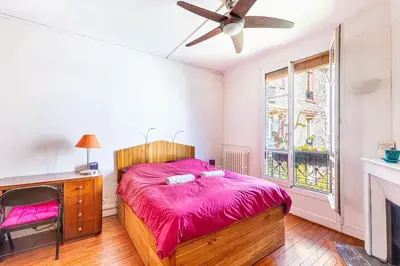 Un ou plusieurs lits dans un hébergement de l'établissement GuestReady -Logement accueillant proche Montmartre
