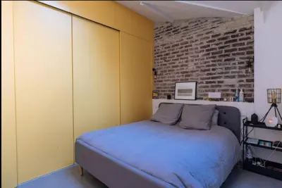 Un ou plusieurs lits dans un hébergement de l'établissement Stylish 1BD Loft Canal Saint-Martin!