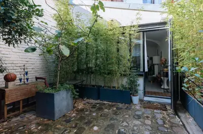 Jardin de l'établissement Stylish 1BD Loft Canal Saint-Martin!