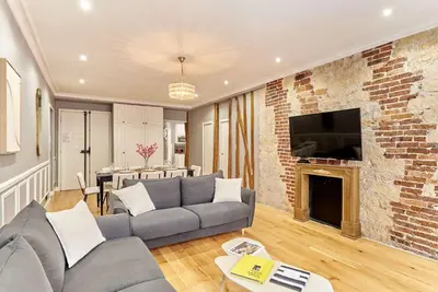 Télévision ou salle de divertissement dans l'établissement Apartment Opéra by Studio prestige