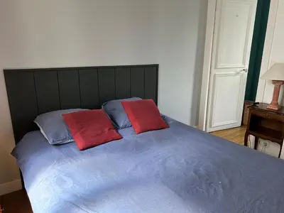 Un ou plusieurs lits dans un hébergement de l'établissement L'appartement Jean Moulin