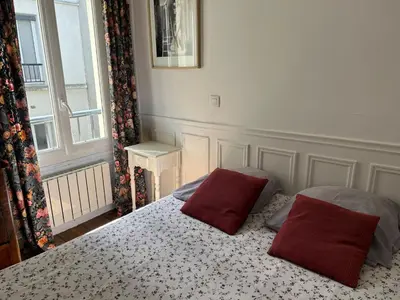 Un ou plusieurs lits dans un hébergement de l'établissement L'appartement Jean Moulin