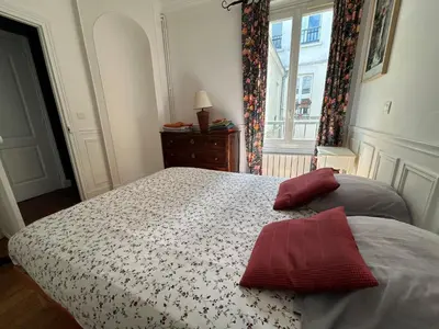 Un ou plusieurs lits dans un hébergement de l'établissement L'appartement Jean Moulin