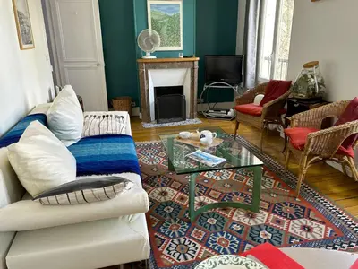 Coin salon dans l'établissement L'appartement Jean Moulin
