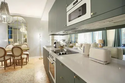 Cuisine ou kitchenette dans l'établissement Résidence Opéra by Studio prestige