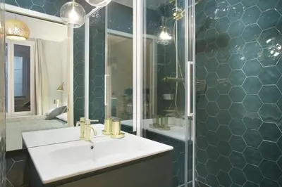 Salle de bains dans l'établissement Résidence Opéra by Studio prestige
