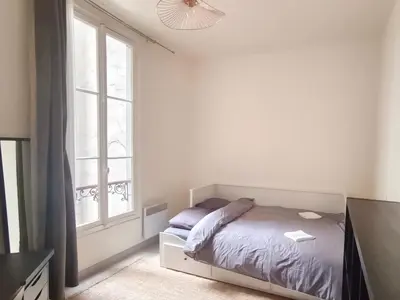 Un ou plusieurs lits dans un hébergement de l'établissement Bel appartement au Marais de Paris