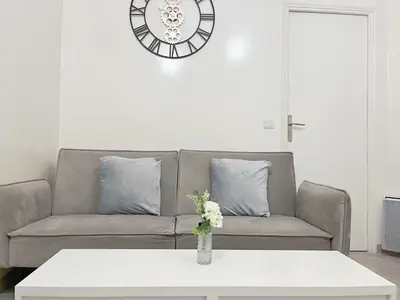 Coin salon dans l'établissement Bel appartement au Marais de Paris