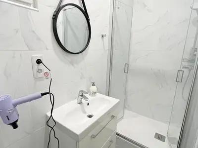 Salle de bains dans l'établissement Bel appartement au Marais de Paris